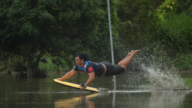 Paeroa Paul has fun in the floodwaters at Flooded Gum Park at Pacific Pines. Picture: Glenn Hampson