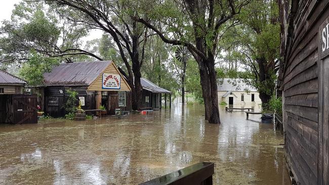 Historical buildings have been inundated with floodwaters. Picture: Helen Scotland