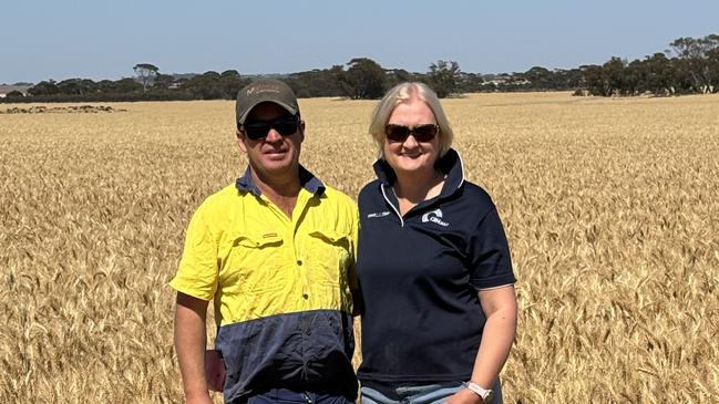 Bruce and Heather Talbot in a crop of wheat on their Western Australian property. Picture: Supplied