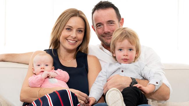 AAP   WENTWORTH COURIERAllison Langdon, Mike Willesee pose for a photo with their children, baby Scout and Mack, 2 at their home in Bronte on Saturday May 25 2019. Allison is an ambassador for RU OK and is doing the Anytime Fitness treadmill challenge to raise funds. (AAP IMAGE / MONIQUE HARMER)