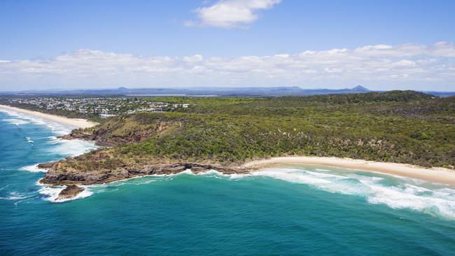 Aerial view over Alexandra Bay in the Noosa National Park, looking south to Sunshine Beach and beyond. Picture: Lachie Millard