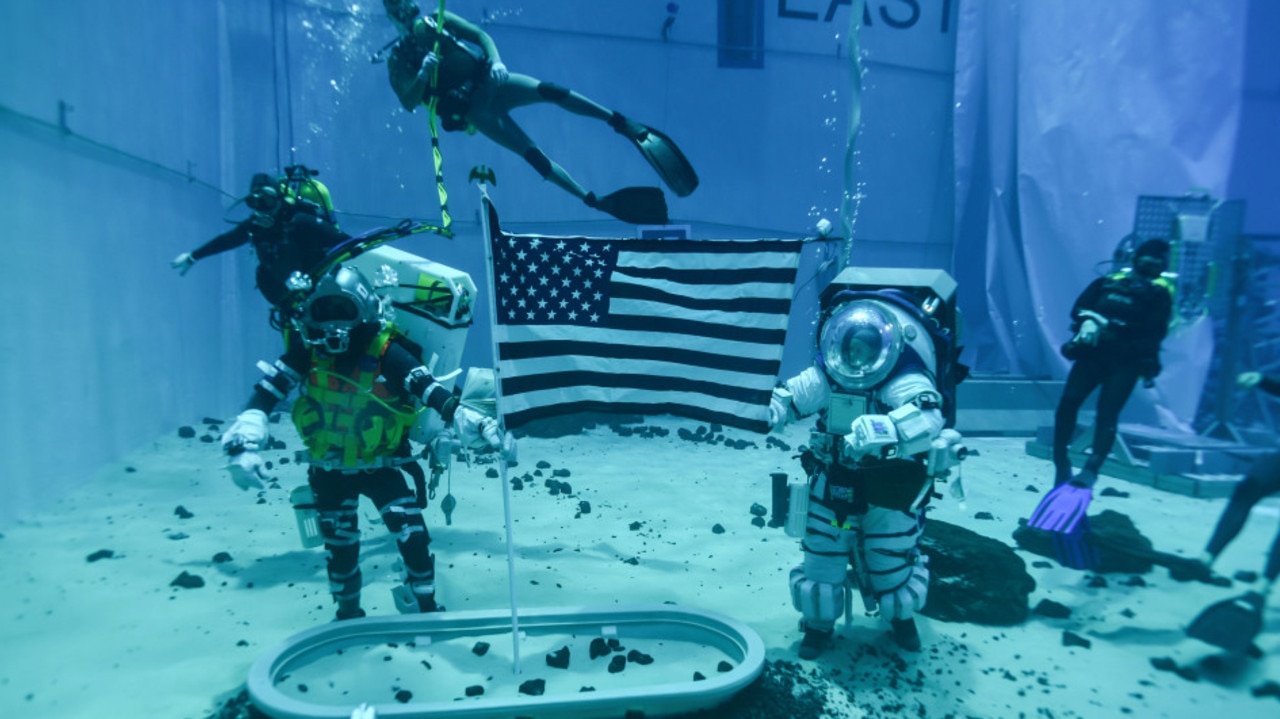 The tests include practising picking up Moon rocks and planting an American flag Credit: NASA