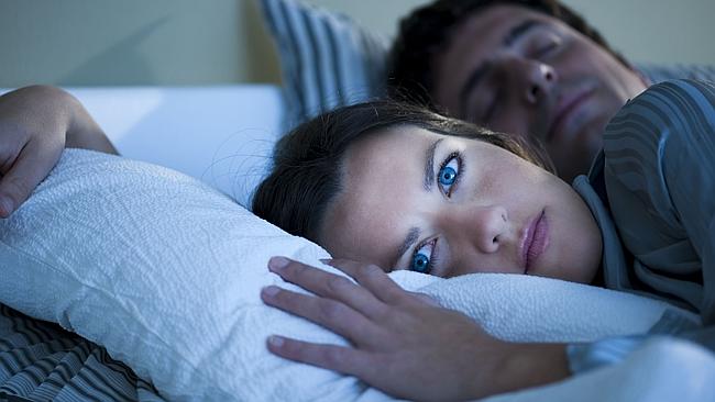 Sleep deprived woman, can&#39;t get to sleep. (Thinkstock pic)