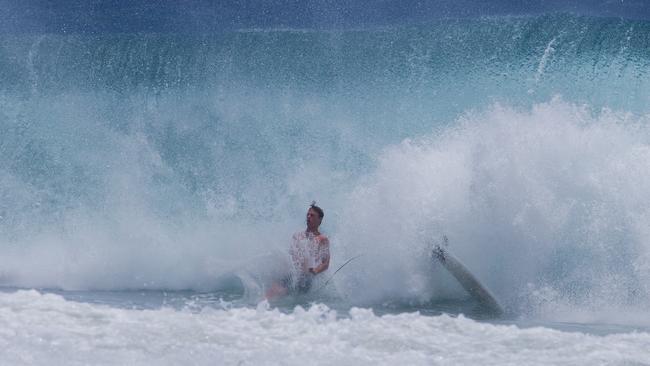 Surfers enjoying the larger swell at Snapper Rocks on Sunday 2 January 2022. Picture: Jerad Williams