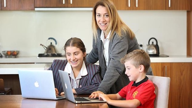 Debra Smith at home with daughter, Laura, 18 and son, Luca, 8.