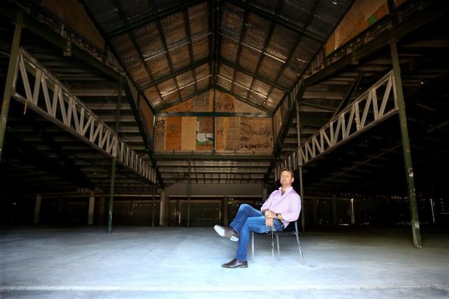 Angus Southwell opens the doors to the once Club Watersport on Fraiser drive, having stripped it out ready for contruction. Photo: Nolan Verheij-Full / Tweed Daily News. Picture: Nolan Verheij-Full