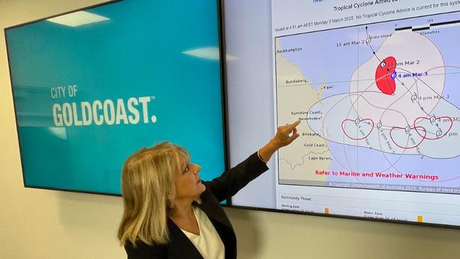 Acting Gold Coast mayor Donna Gates points out the dangers of Tropical Cyclone Alfred at the Disaster and Management Centre.