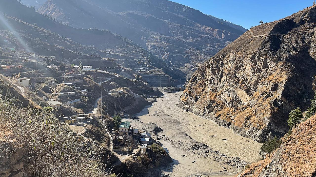 A view of an Indian hydropower project site damaged after a broken glacier caused a major river surge that swept away bridges and roads, near Joshimath in Chamoli district of Uttarakhand, on February 7, 2021. (Photo by Ajay BHATT / AFP)