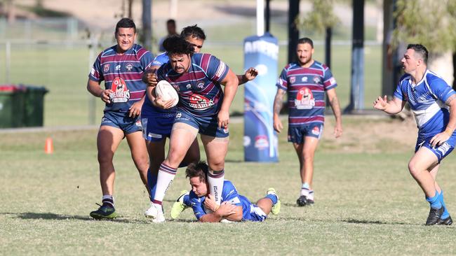 Anthony Gray charges forward for Ormeau. Picture: AAP Image/Richard Gosling