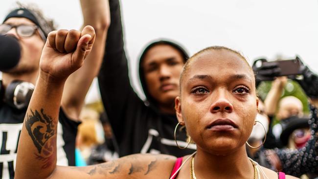 A demonstrator cries during a protest against Trump’s visit in Kenosha, Wisconsin. Trump called anti-police demonstrations in the city acts of "domestic terror" committed by violent mobs. Picture: AFP