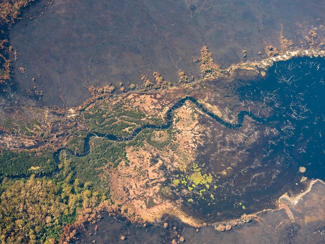 2019 Tasmanian bush fires. Huon River joining Lake Pedder, Celtic Hill Fire - at Southwest National Park. . Picture - LUKE TSCHARKE / PAR AVION