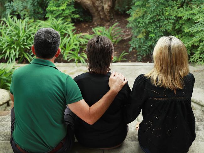 Will and his parents at their Sydney home. Picture: John Feder