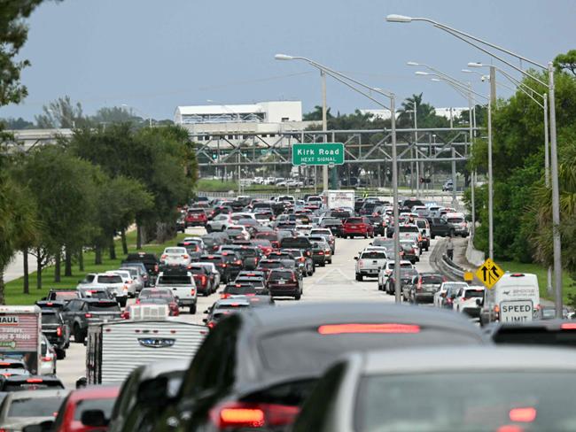 Cars are stuck in traffic after police blocked the road in West Palm Beach, Florida, following the shooting. Picture: AFP