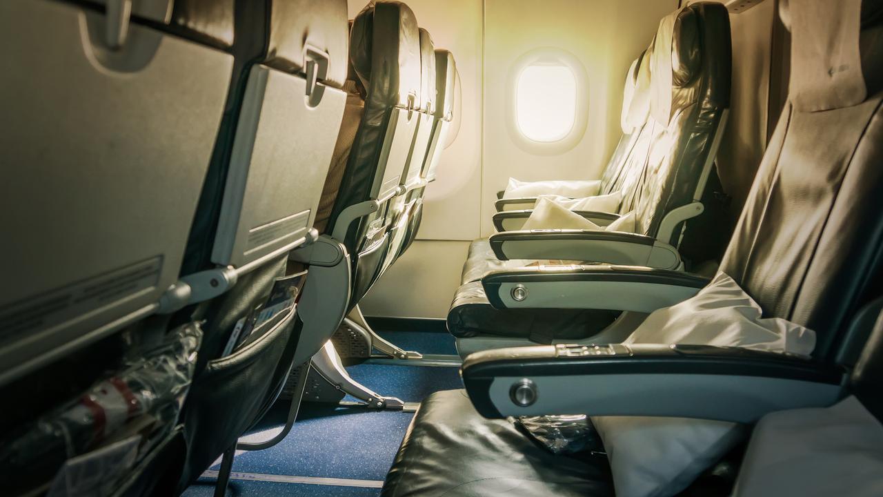 Travel experts reveal who is entitled to plane armrest