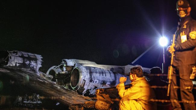 The debris of the charter Westwind 24 that crashed at Manila’s Ninoy Aquino International Airport on Sunday night, killing all eight on board. Picture: Getty Images