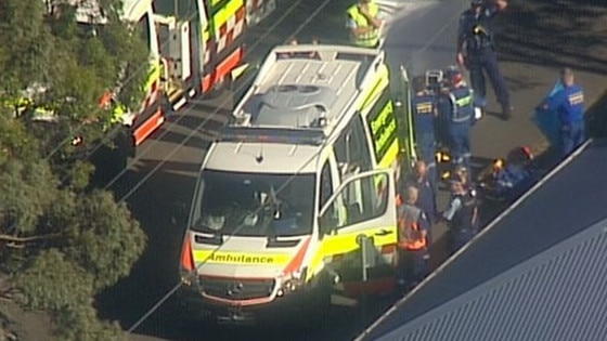 Police and paramedics at the shooting scene today. Picture: Nine News