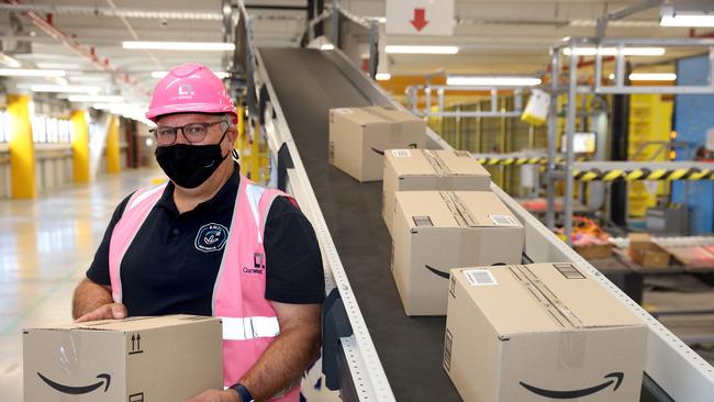 Craig Fuller, director of operations for Amazon Australia pictured at the Amazon robotics fulfilment centre in Kemps Creeks, Sydney. Picture by Damian Shaw