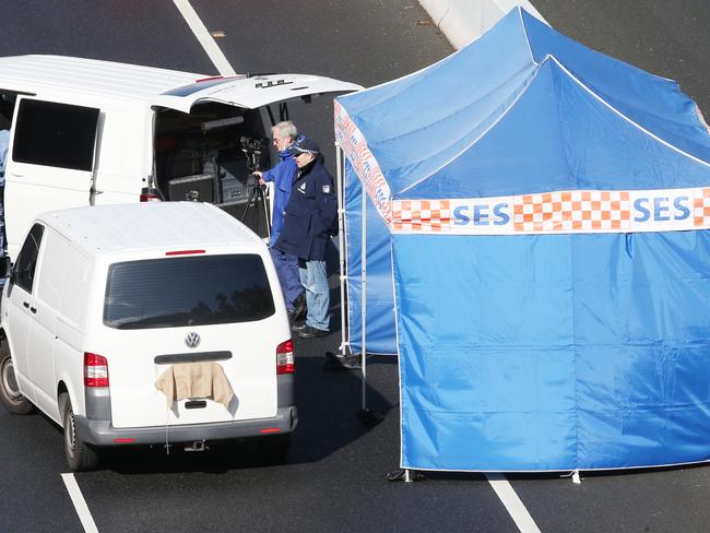 Police and emergency services on the Eastern freeway investigate a white van which is possibly involved in a shooting. Saturday, November 9, 2019. Picture: David Crosling Eastlink shooting victim Paul Virgona