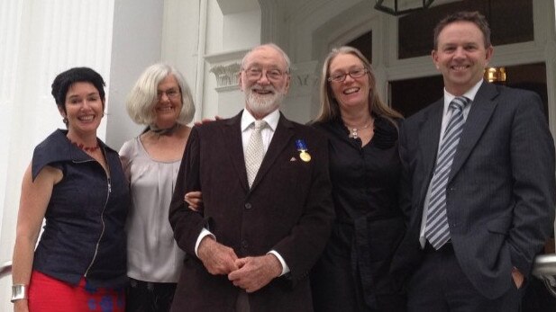 Des Ritchie receives his Order of Australia medal in 2012. Pictured with his daughter Roisin, partner Jillian, daughter Tanya and son Michael.