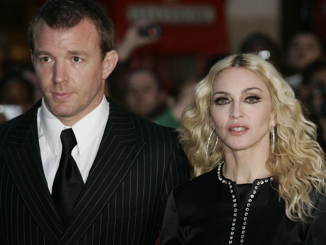 Happier times ... British director Guy Ritchie, left, and his ex-wife Madonna had two children together.