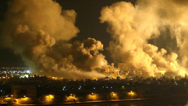 Smoke covers the presidential palace compound in Baghdad, March 21, 2003 during a US-led air raid. Picture: AFP/Getty Images/The Times