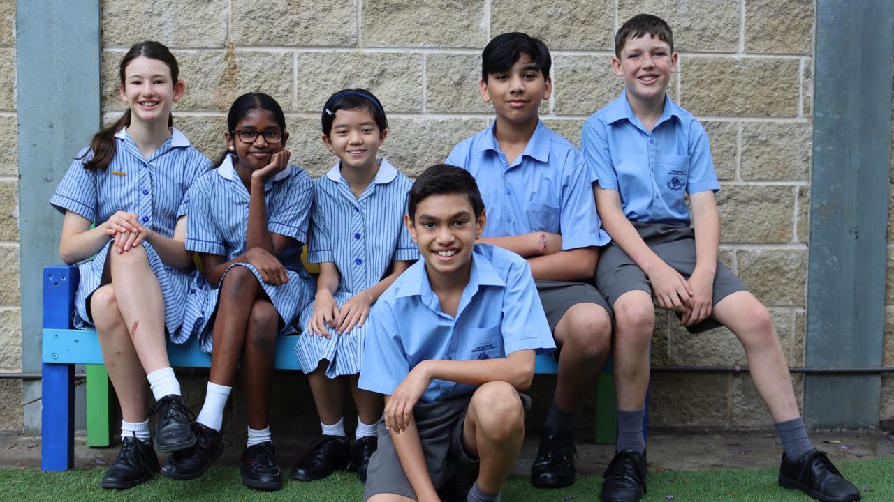 A group entry from Year 5 students at St Agatha's Pennant Hills, has won the Primary News Story (Print) category of the inaugural Kids News Junior Journalist competition for their story on organ donation. From left to right: Layla Hasrouni, 11, Meghna Dharmadasa, 11, Gabrielle Wen, 10, Andric Pereira, 11, Raghav Sharma, 11, Angus Madigan, 11