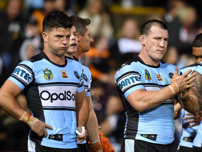 (l to R) Chad Townsend, Paul Gallen and Andrew Fifita of the Sharks look on following a try scored by Kevin Naiqama of the Tigers during the round 9 NRL match between the West Tigers and the Cronulla Sutherland Sharks at Leichhardt Oval in Sydney on Saturday, April 29, 2017. (AAP Image/Paul Miller) NO ARCHIVING, EDITORIAL USE ONLY