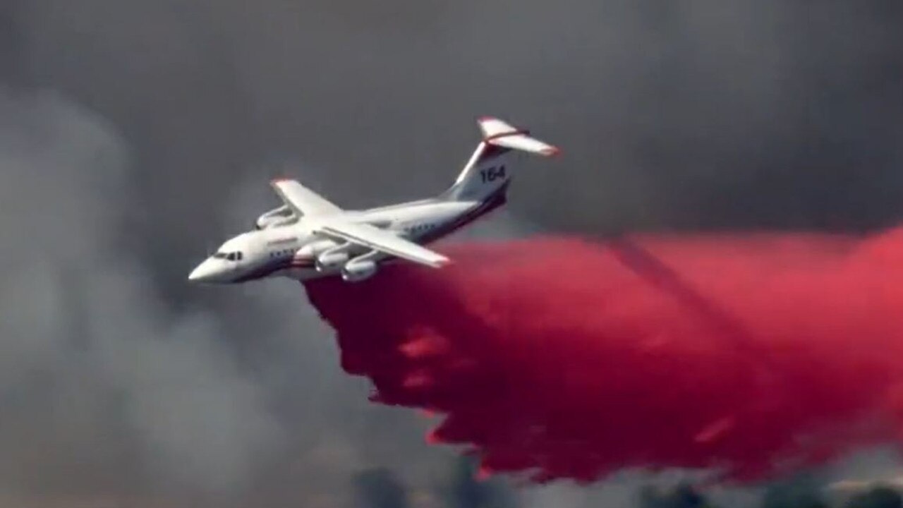 A large air tanker flown in from NSW has joined the firefighting efforts. Photo: 9 News