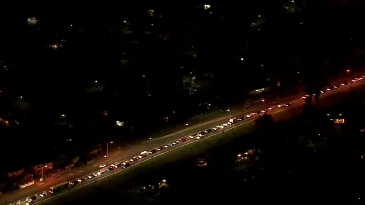 Long Covid testing queues in Fairfield on the night of Tuesday 13 July 2021. Picture: ABC News