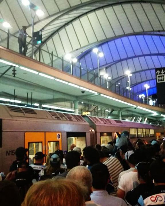 AU NSW:    Sharks Supporters Break into Song While Waiting for Train   October 02