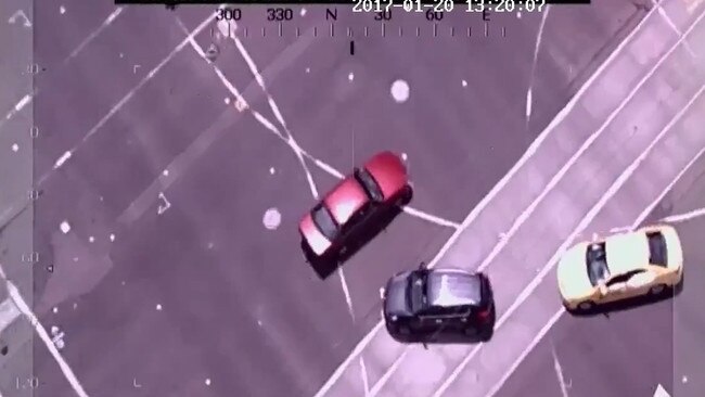 Footage released by Victoria Poice of Dimitrious Gargasoulas being chased by police. The footage shows Gargasoulas passing cars and driving on tram lines before doing burnouts at the intersection of Bouke and Flinders streets.