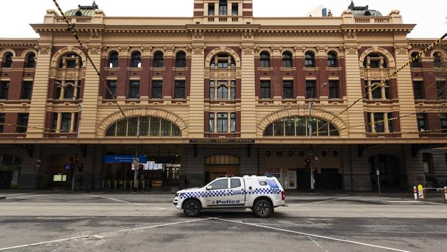 One of Melbourne’s busiest intersections was empty on Sunday. Picture: Daniel Pockett