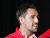 Mitchell Pearce (brown) and Martin Kennedy (blonde) from the Sydney Roosters at Holy Cross Catholic Primary School in Bondi Junction.