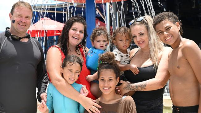 Jason Hedges, Aaela Parker, Aya Hedges,7, Haylon Singh, 1, Nailey Naawi, 12, Kevaru-Ace Hakalitz, 1, Hayley Minton and Kusine Naawi,13, cool off in the Australia Day heat at Tobruk Pool. Picture: Isaac McCarthy