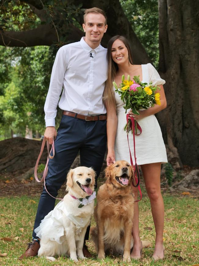 Adelaide 36ers guard Anthony Drmic ties the knot with fiancee Jenna Griggs in Botanic Park with their dogs Owen and Lily looking on. Picture: Brandon Hancock.