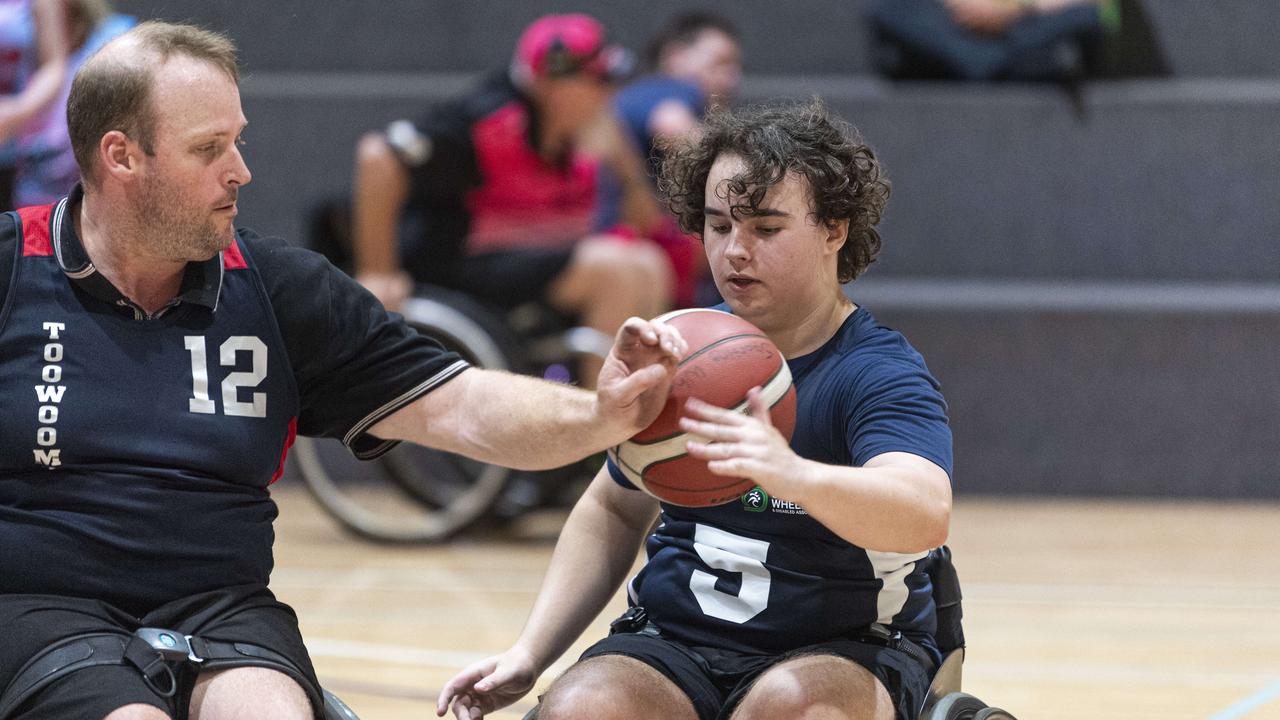 Lachlan Steinohrt (left) of SW Toowoomba competes for possession with Isaac Adams-Steele of SW Brisbane.