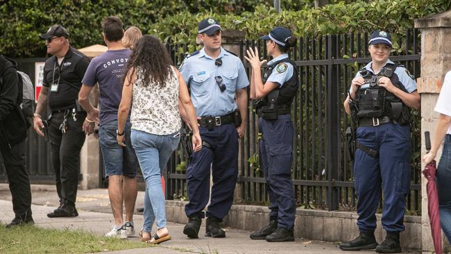 Police at the front gates of Mount Sinai College in Maroubra on Friday morning. Picture: Julian Andrews