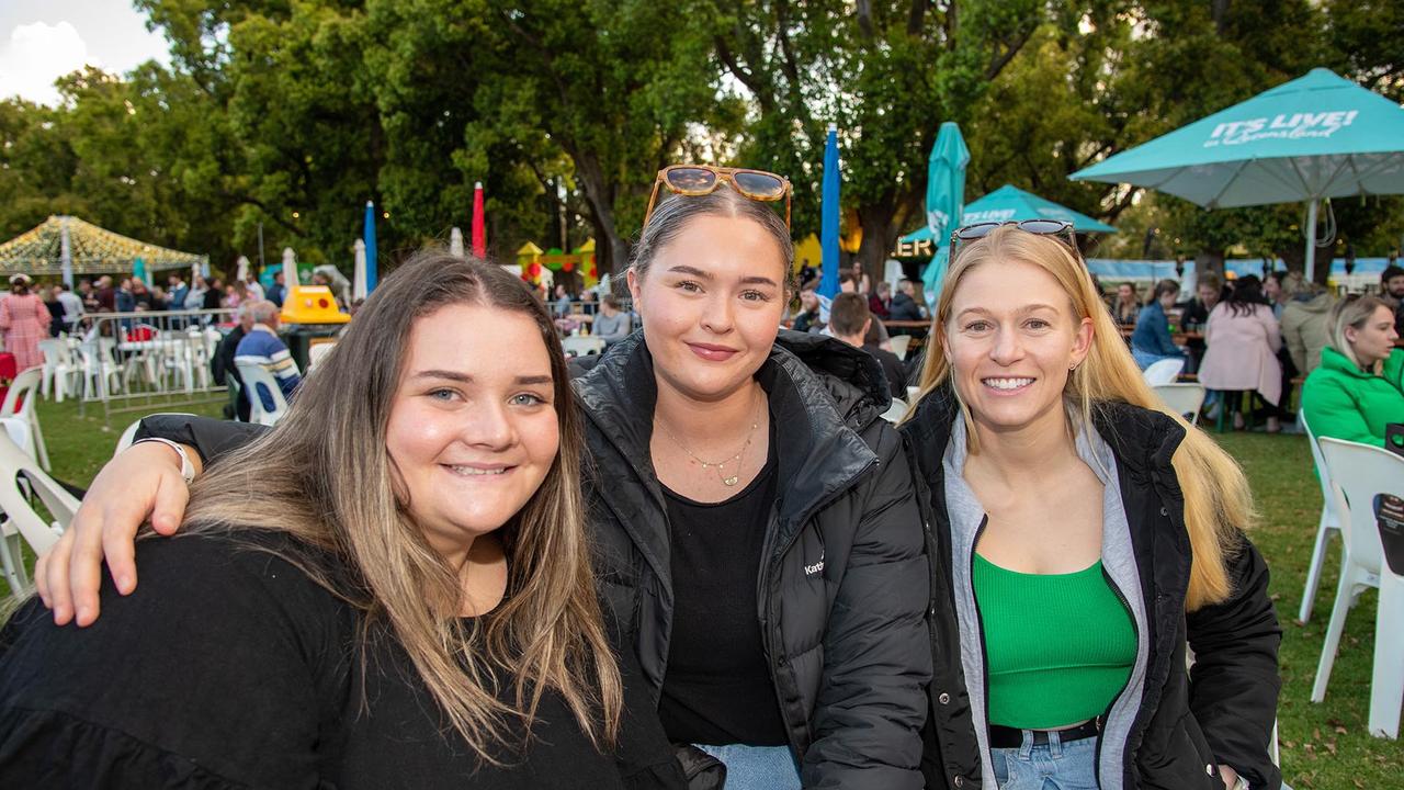Emma Taylor (left), Ada McKenzie and Jane Herrick. Festival of Food and Wine, Queens Park, Toowoomba Carnival of Flowers. Friday September 9, 2022 Picture: Bev Lacey