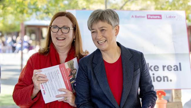 Boothby candidate Louise Miller-Frost with shadow foreign minister Penny Wong before voting at Colonel Light Gardens Primary School. Picture: Naomi Jellicoe