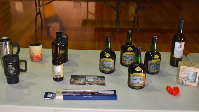 Mr Wrench calls this the ‘Grog table’, complete with an edition of port for the 75th anniversary of the landing at Gallipoli in 1990. (Picture: Kristen Camp)