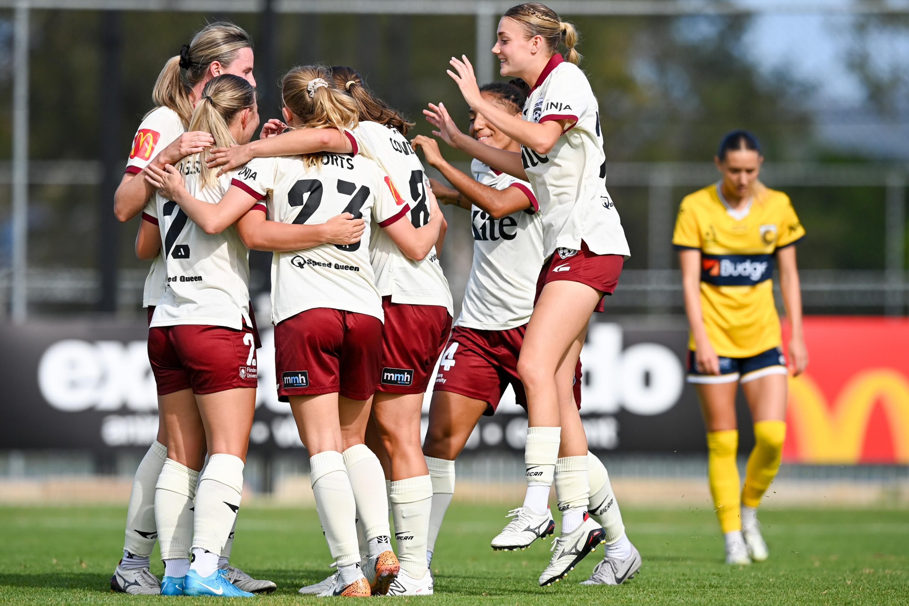 Emily Hodgson and teammates celebrate her goal. Picture: Izhar Khan/Getty Images