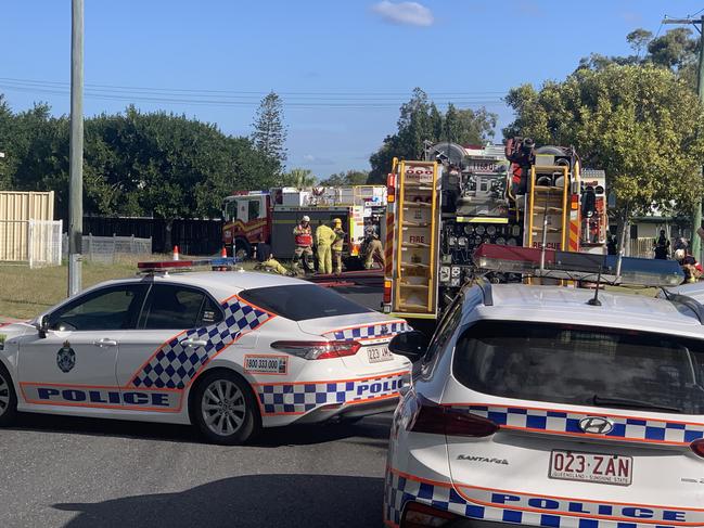 Emergency services at the scene of a house fire on Fisher Street.