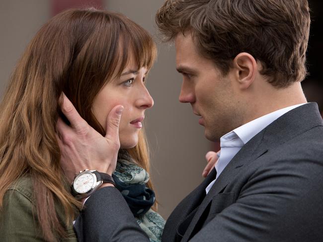 Dakota Johnson and Jamie Dornan in a scene from Fifty Shades of Grey.