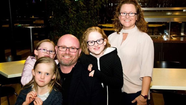 Mathew Werfel, 42, has been awarded $2.2m in compensation for cancer he contracted from breathing asbestos fibres. Pictured with his wife Jenny and three daughters, aged 10, 7 and 6, Mr Werfel’s legal win paves the way for more claims against Amaco Pty Ltd, formerly James Hardie. Picture: Supplied By Family