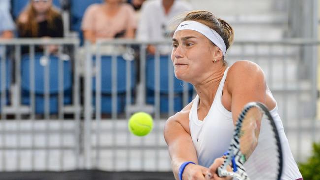 Aryna Sabalenka of Belarus hits a return against Simona Halep of Romania during their women's singles quarter-final match at the Adelaide International. Picture: Brenton EDWARDS / AFP.