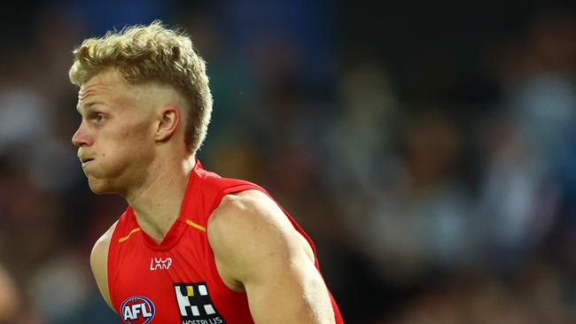 GOLD COAST, AUSTRALIA - JUNE 29: Bodhi Uwland of the Suns in action during the round 16 AFL match between Gold Coast Suns and Collingwood Magpies at People First Stadium, on June 29, 2024, in Gold Coast, Australia. (Photo by Chris Hyde/Getty Images)