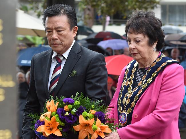 Former Manly Council general manager Henry Wong with then-Manly mayor Jean Hay at a 2014 Anzac Day ceremony.