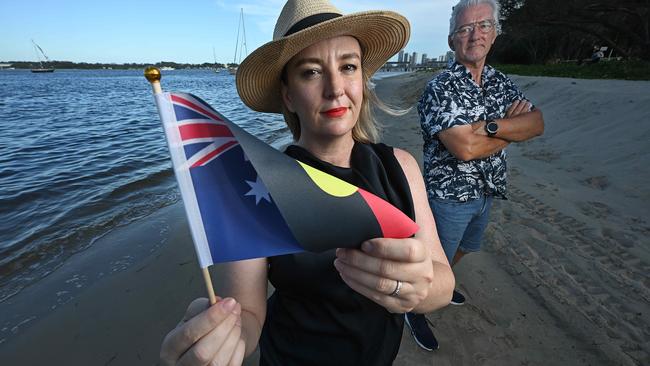 22/12/2025: Gold Coast Cr. Brooke Patterson holding the combination flag she has had changed with David Keys, who notified her of the flag, on the beach at South Port, Gold Coast. pic: Lyndon Mechielsen/The Australian