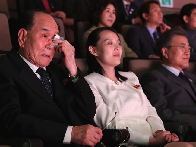 Kim Yong-nam wipes tears next to Mr Moon and Kim Yo-jong during a concert in Seoul by musicians from Pyongyang. Picture: AFP/YONHAP