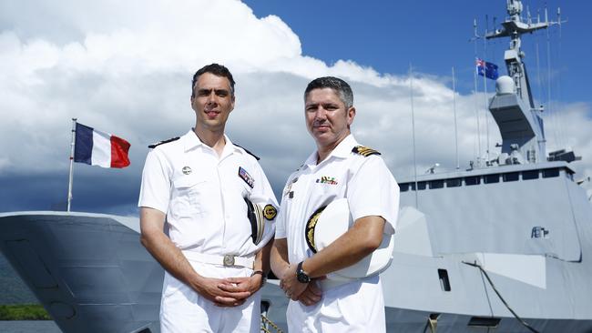 The French navy frigate La Fayette has docked at HMAS Cairns as part of the 155 day worldwide Mission Jeanne d'Arc. La Fayette Commander Ghislain Delepanque is welcomed to Cairns by HMAS Cairns Commander Alfonso Santos. Picture: Brendan Radke